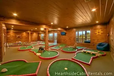indoor golf course in family reunion cabin