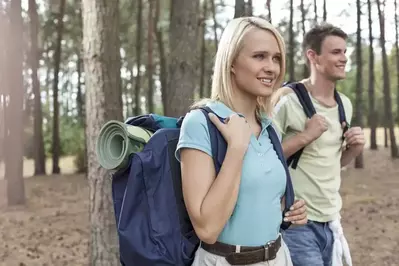 Happy_couple_hiking_near_thier_secluded_Gatlinburg_cabin