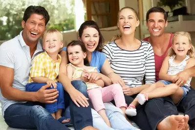 Families enjoying a vacation at a large cabin in Gatlinburg Tn