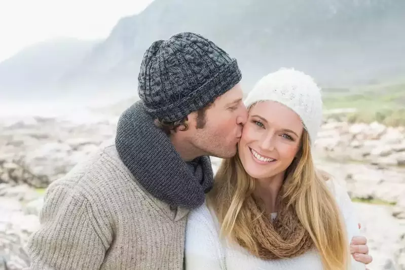 Couple in the mountains during winter