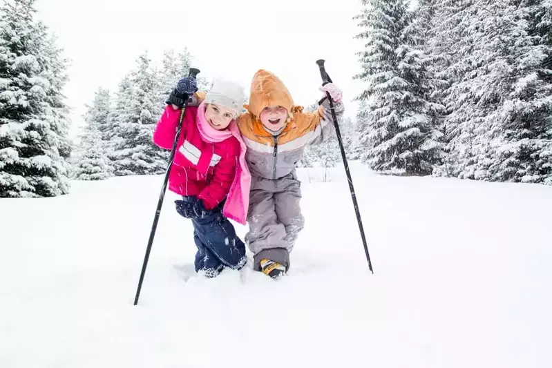 Little girls hiking in the snow in the Smoky Mountains