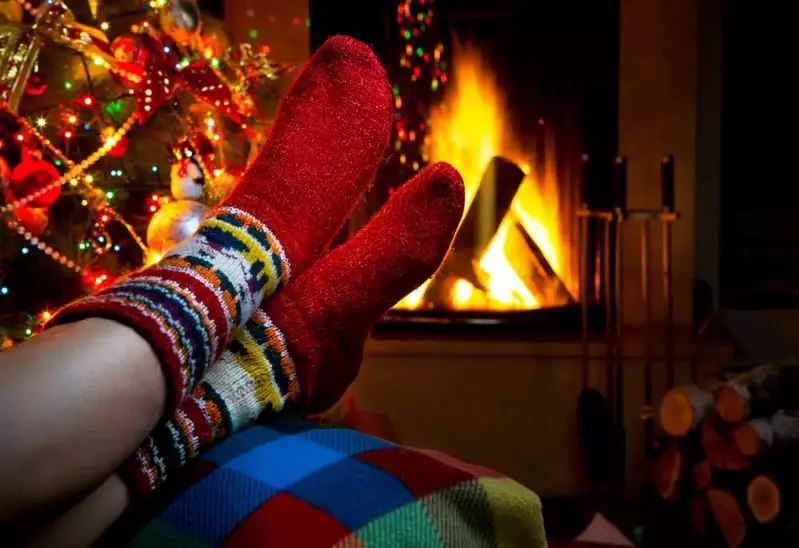 relaxing by the fire at Christmas