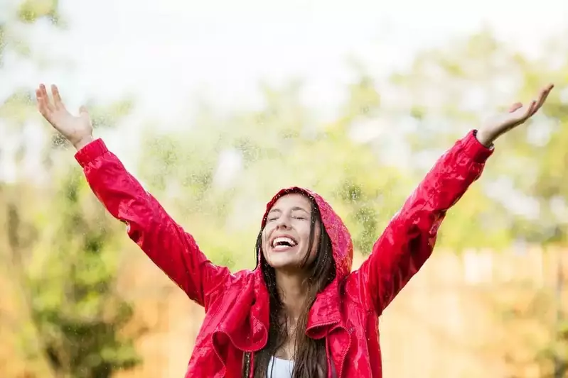woman outside in the rain