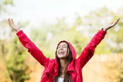woman outside in the rain