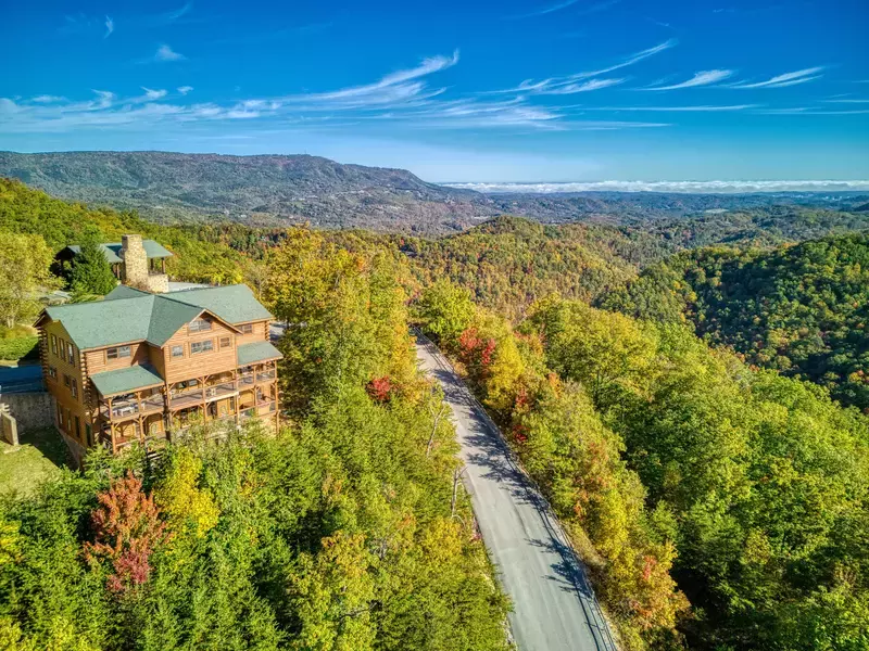 cabin on hill in mountains