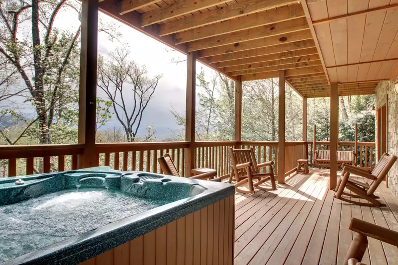 hot tub on deck of family friendly cabin in Gatlinburg TN