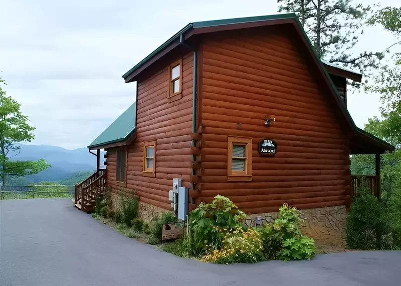 Outside of a beautiful log cabin in Gatlinburg