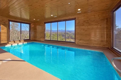 pool inside Splash Mountain Gatlinburg cabin with a mountain view