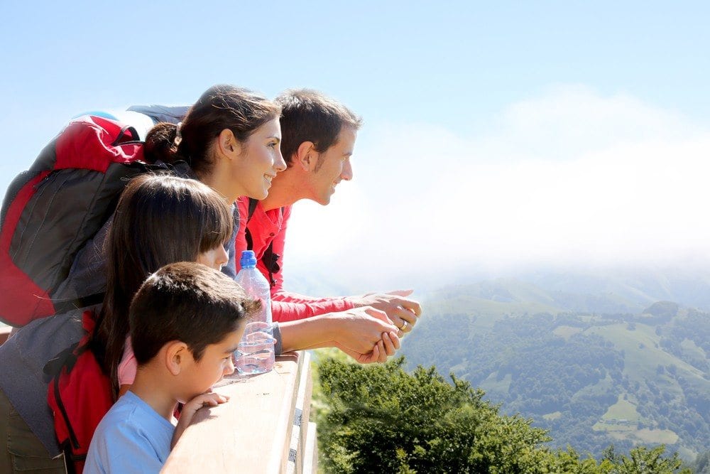 Family enjoying the mountain views while on vacation in the Smoky Mountains