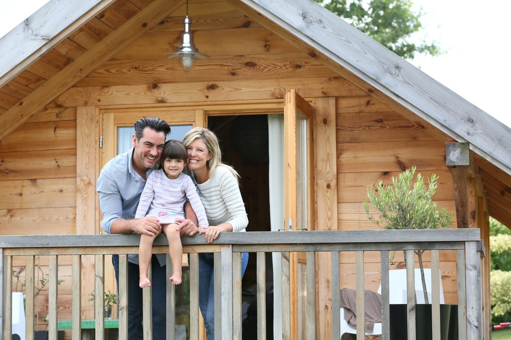 Young family enjoying the deck at a Smoky Mountain vacation rental