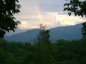 Shot_of_the_Smoky_Mountains_with_a_rainbow_from_a_Gatlinburg_cabin_with_a_mountain_view