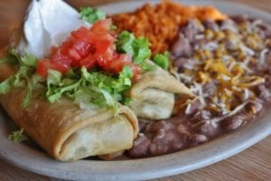 chimichangas with refried beans and rice